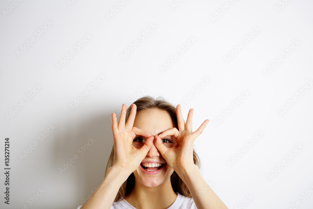 Joyful young woman, sunglasses from finger Joyful young woman, sunglasses from finger
