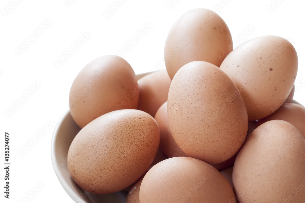Eggs cooking for breakfast, a protein form yolk and albumen on a white background, or on a plain wooden table. Eggs cooking for breakfast, a protein form yolk and albumen on a white background, or on a plain wooden table.