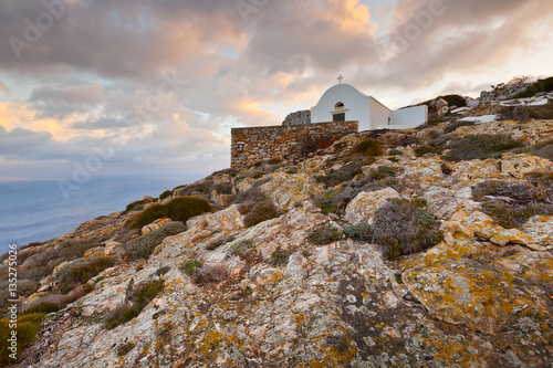 Church over village of Kastro on Sikinos island early in the morning. © milangonda