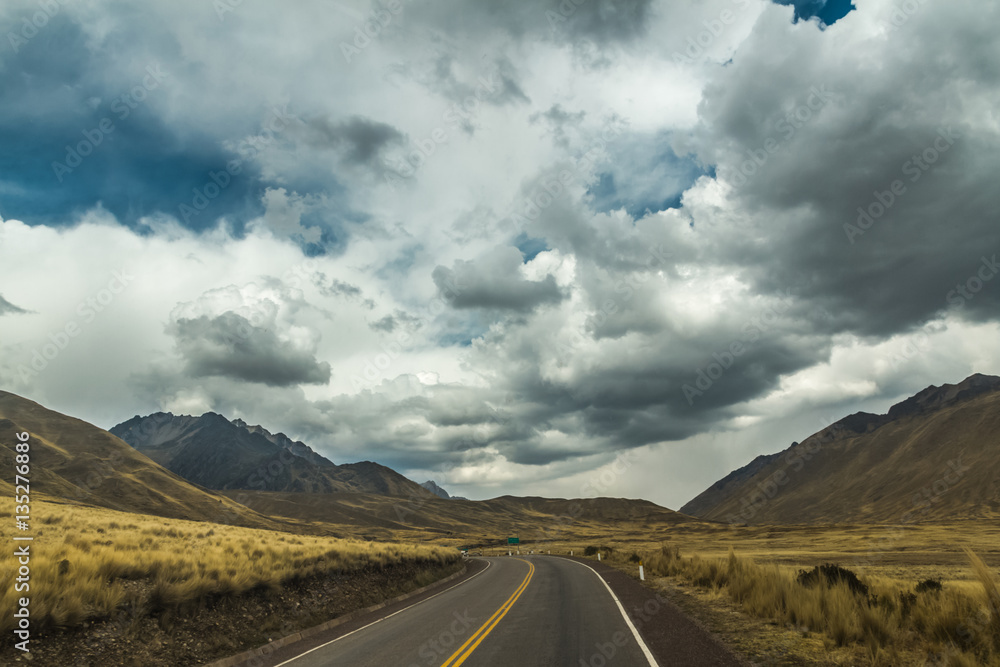 Mountain road in Andes, Peru. Cloudy day.