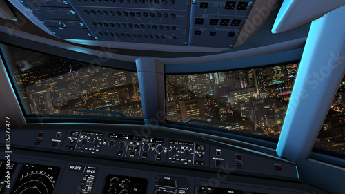 Sicht aus dem Cockpit einer Passagiermaschine im Nachtanflug auf eine Grossstadt