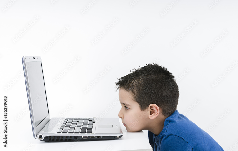 Child Looks at Laptop Isolated Child Looks at Laptop Isolated