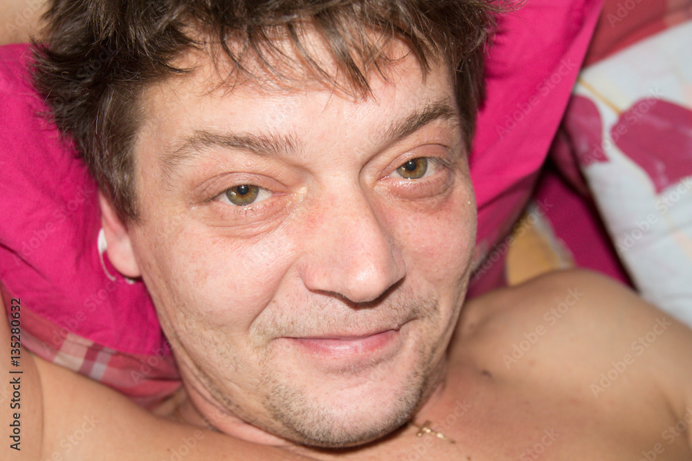 Obraz premium wrinkled face of a man after sleep