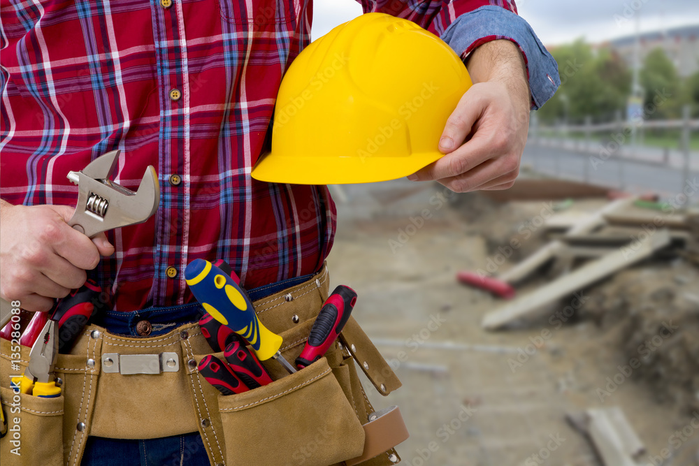 professional of the building with the helmet and the tools professional of the building with the helmet and the tools