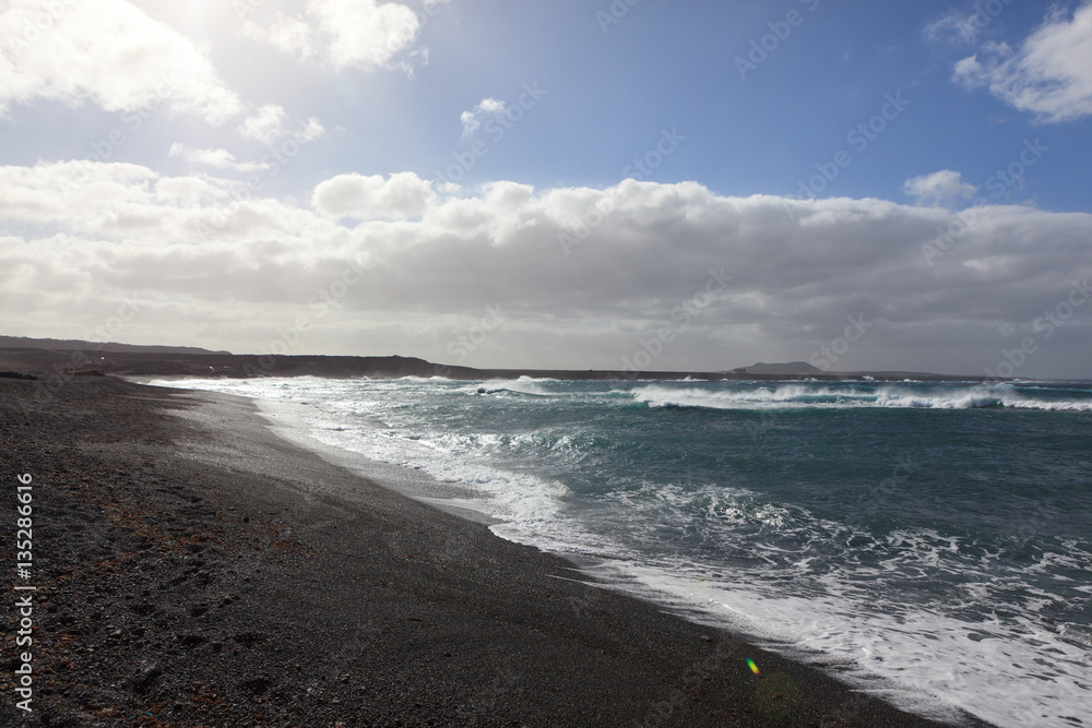 Views of waves crashing against the shore in the Canary island of Lanzarote