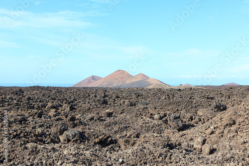A volcano that rises in the countryside in the Canary island of Lanzarote