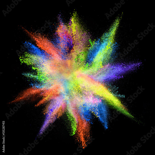 Explosion of colored powder on black background