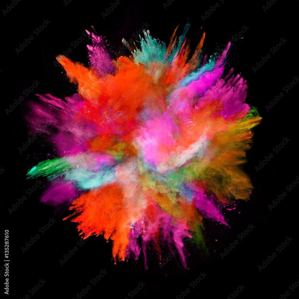 Explosion of colored powder on black background