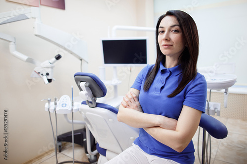 Dentist female at her working place