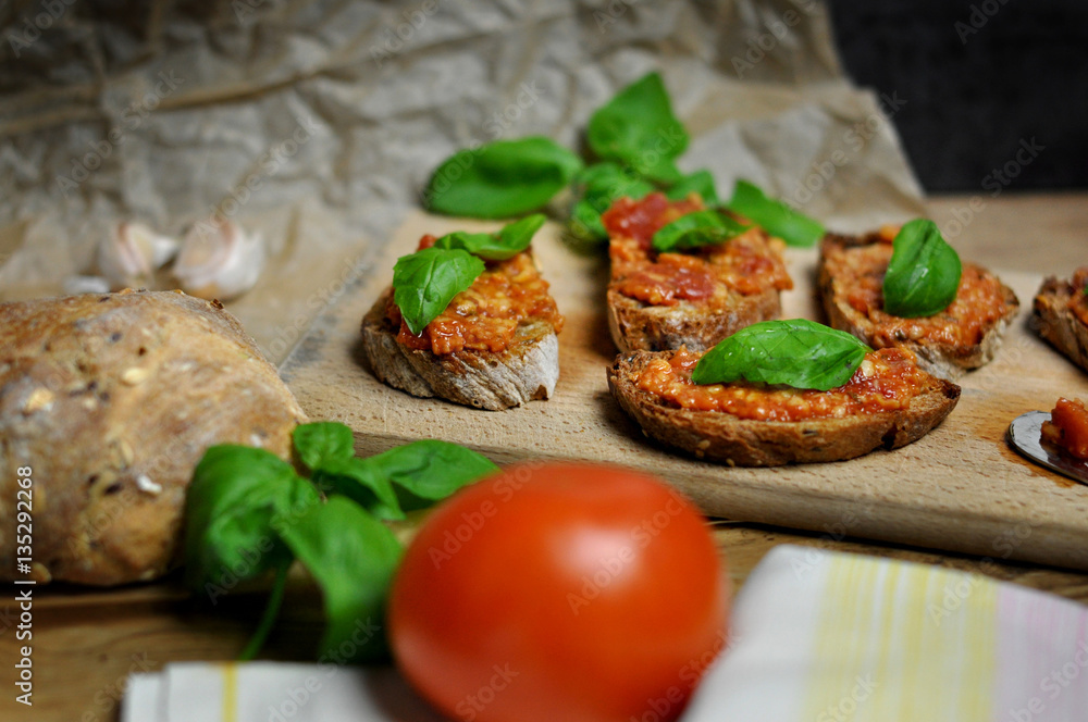 Tasty sandwiches with Bruschetta on wooden board Tasty sandwiches with Bruschetta on wooden board