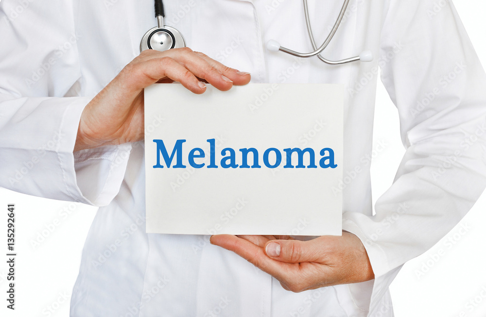 Melanoma card in hands of Medical Doctor