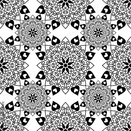 Seamless pattern with mandalas in black and white colors. Vector background.