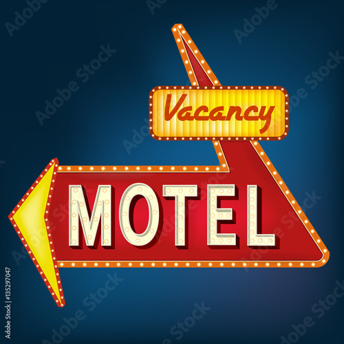 Glowing motel sign with light bulbs