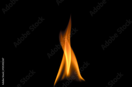 Detail of little flame on blackg background