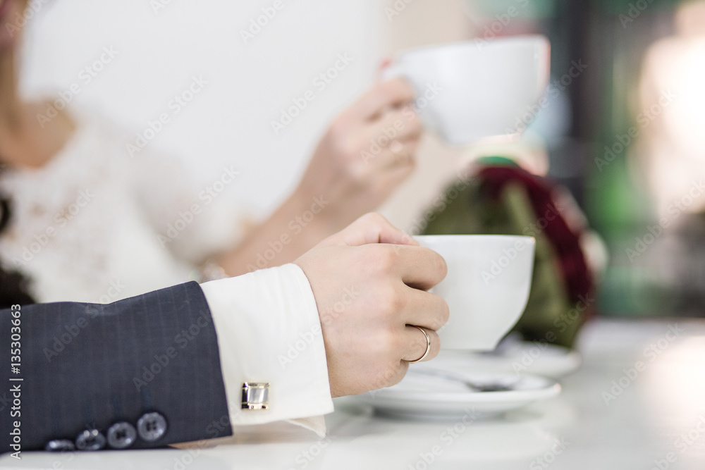 Typical coffee terrace with two cups of coffe on the tables and chairs