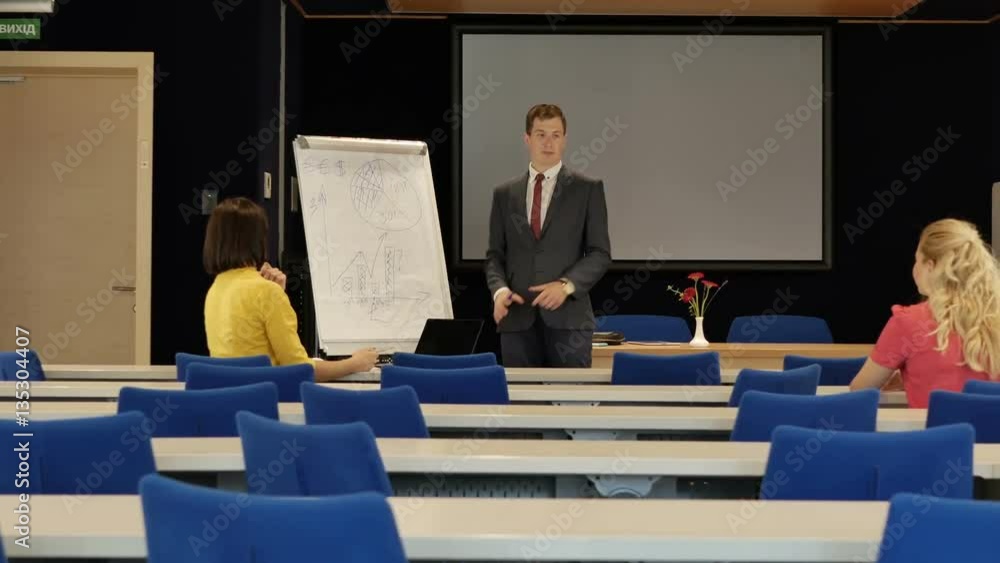 The man tells the presentation. The man tells the presentation.