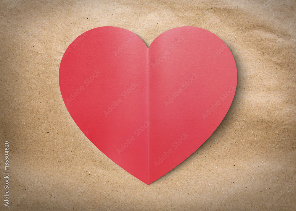 Red heart isolate card on brown paper for valentine's day