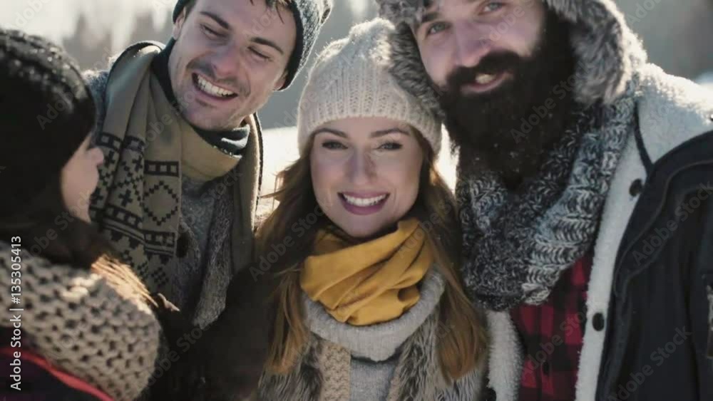 Affectionate couples posing in front of camera Affectionate couples posing in front of camera