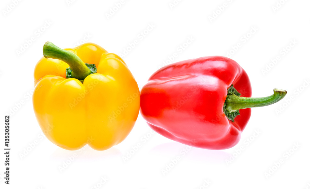 Yellow and red peppers isolated on white background Yellow and red peppers isolated on white background