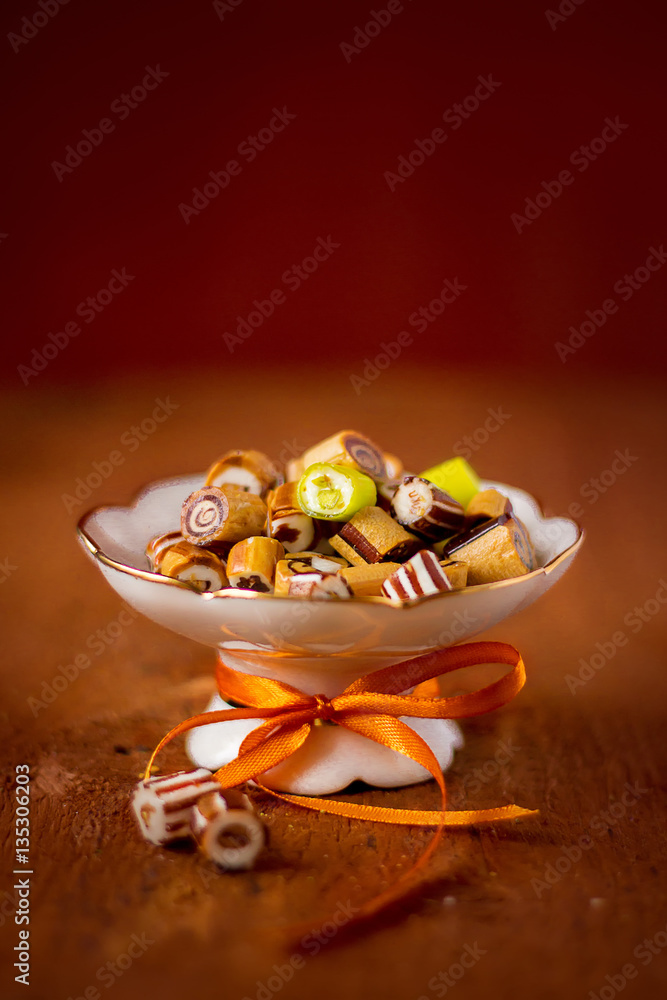 Hand made candies in white beautiful plate Hand made candies in white beautiful plate