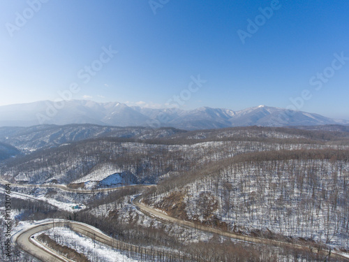 Aerial view of winter mountain road.