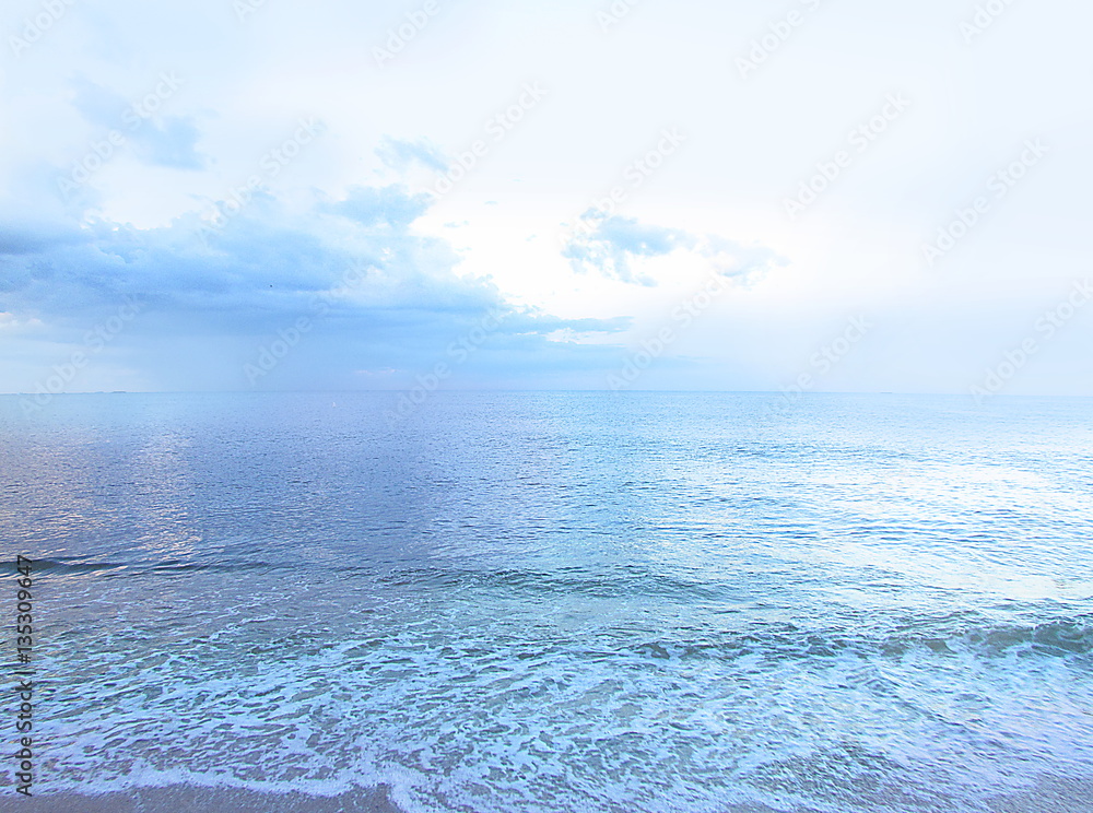 Naklejka premium Sunset by the ocean