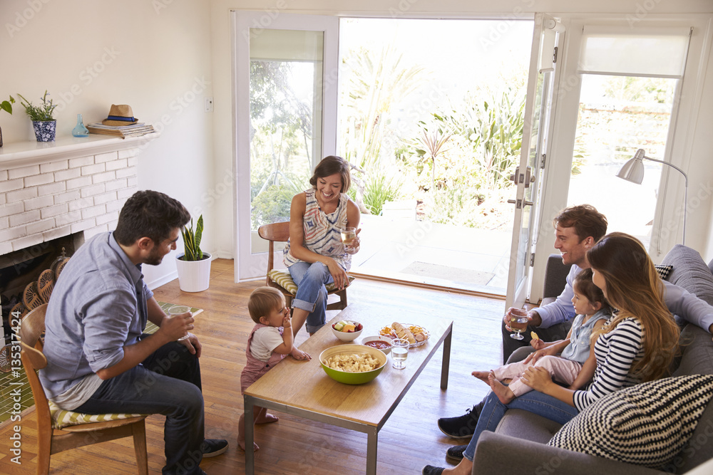 Two Families Getting Together At Home Two Families Getting Together At Home