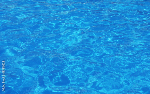beautiful clear pool water reflecting in the sun