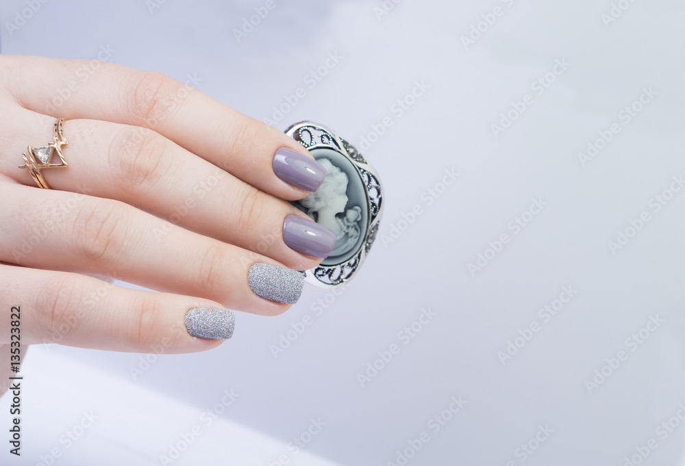 Beautiful hands and natural nails, ideal clean manicure. Decorated with stylish elements Beautiful hands and natural nails, ideal clean manicure. Decorated with stylish elements