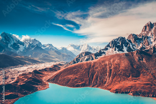 Himalayas. View from Gokyo Ri, 5360 meters up in the Himalaya Mountains of Nepal, snow covered high peaks and lake not far from Everest.