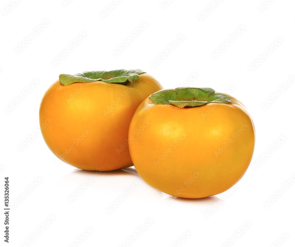 Persimmons fruits isolated on white background Persimmons fruits isolated on white background