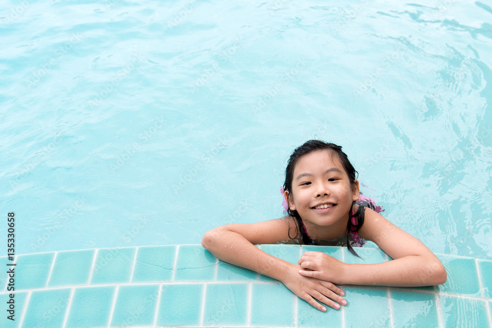 Asian child in the pool