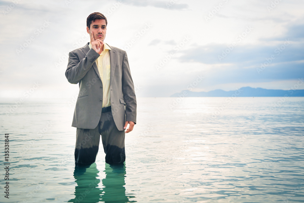 Businessman Knee-deep In Water Businessman Knee-deep In Water