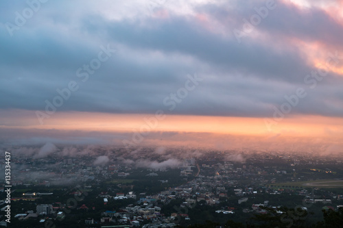 Sunrise at city of Chiang mai, Doi suthep Chiang Mai Thailand. © sorranop01