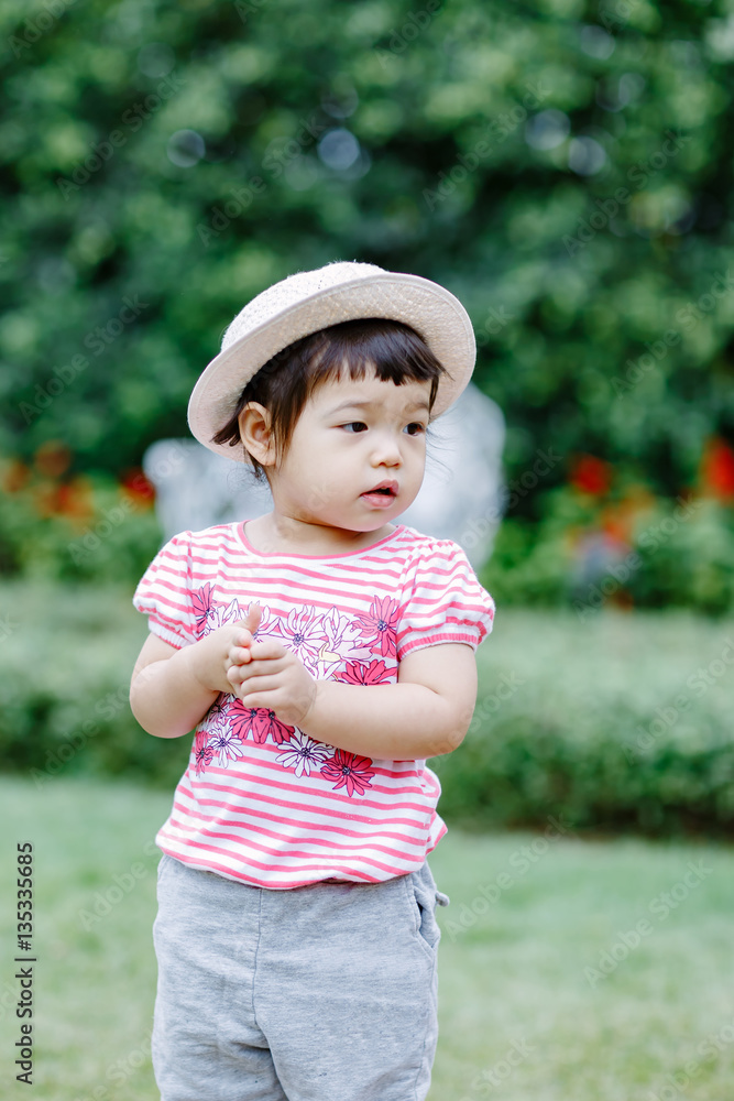 The little girl Running for fun in the garden. The little girl Running for fun in the garden.