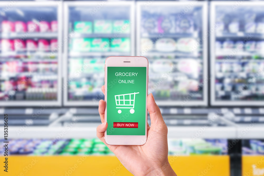 woman hand holding mobile with grocery online on screen with bl Stock ...