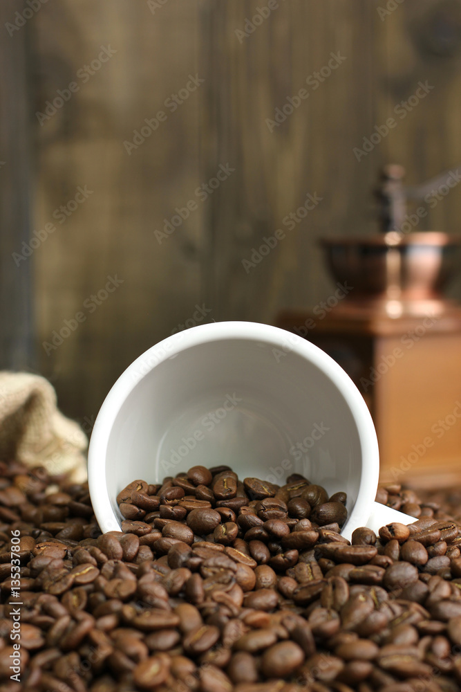 Fototapeta premium Fresh coffee beans with a cup 