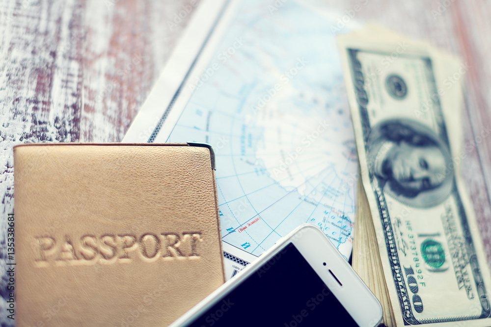 objects for travel isolated on a wooden background objects for travel isolated on a wooden background