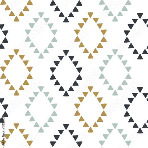 Seamless hand drawn geometric tribal pattern with rhombuses and triangles. Vector navajo design.