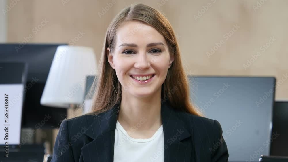 Portrait of Smiling Woman in Office Portrait of Smiling Woman in Office