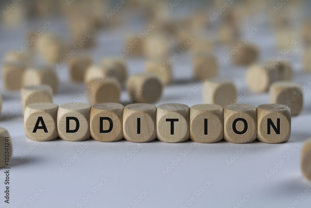 addition - cube with letters, sign with wooden cubes addition - cube with letters, sign with wooden cubes