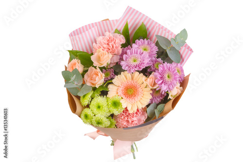 Bright buketny composition from fresh flowers, the white isolated background photo