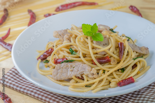 Spicy spagetti with stir-fried pork   dried chilli and basil   Thailand style food