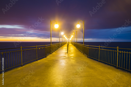 Fototapeta Naklejka Na Ścianę i Meble -  pier overlooking the sea after sunset