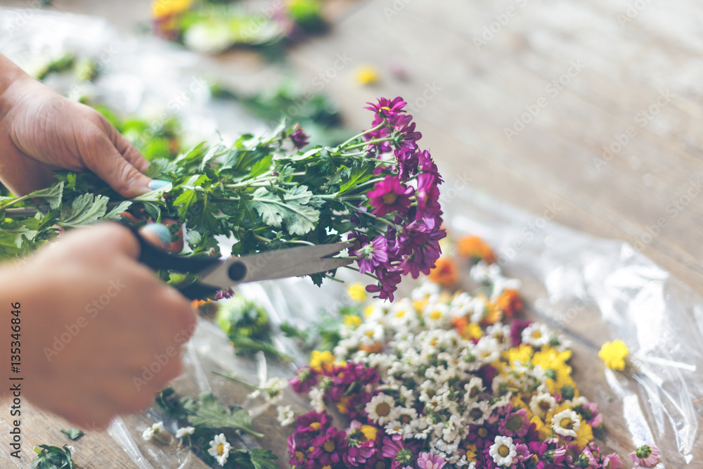 Florist making flower decoration