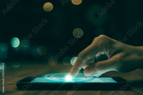 Close up of people hand using smartphone in technology and socia