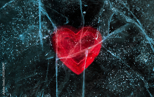 Love red heart frozen in ice. Valentine's day.