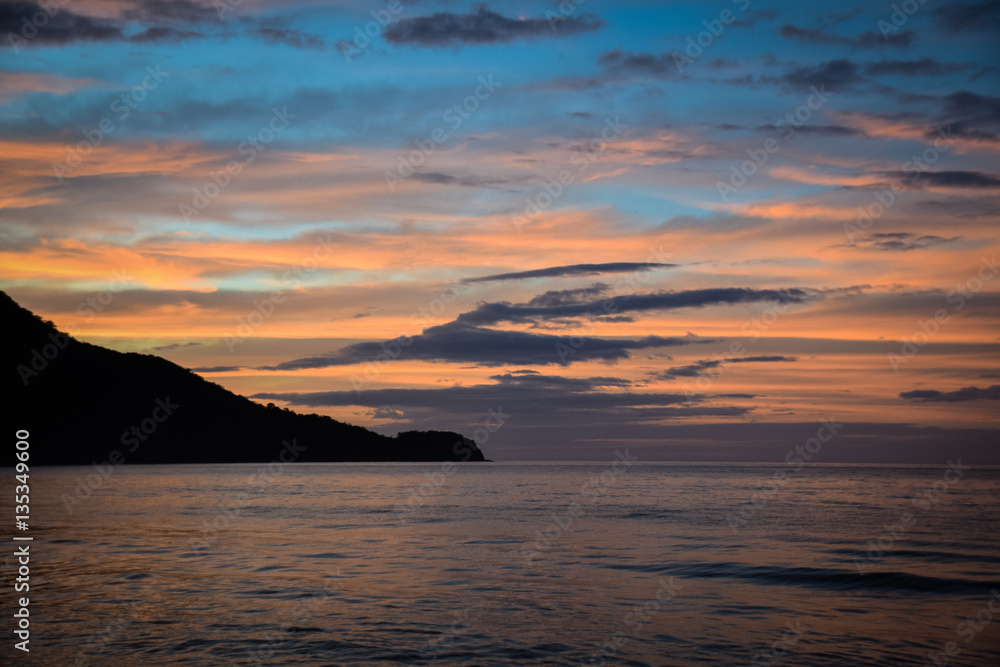 Sunset with silhouetted headland, Guanacaste, Costa Rica