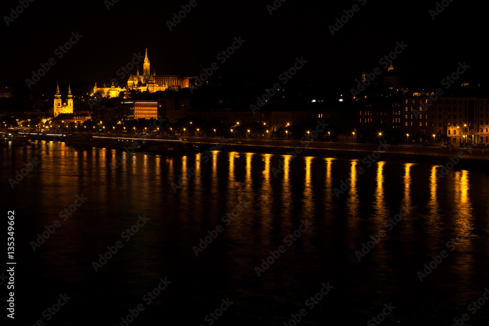 Night few on Fisherman's Bastion and St. Matthias church from the side of the Dunabe river, Budapest, Hungary