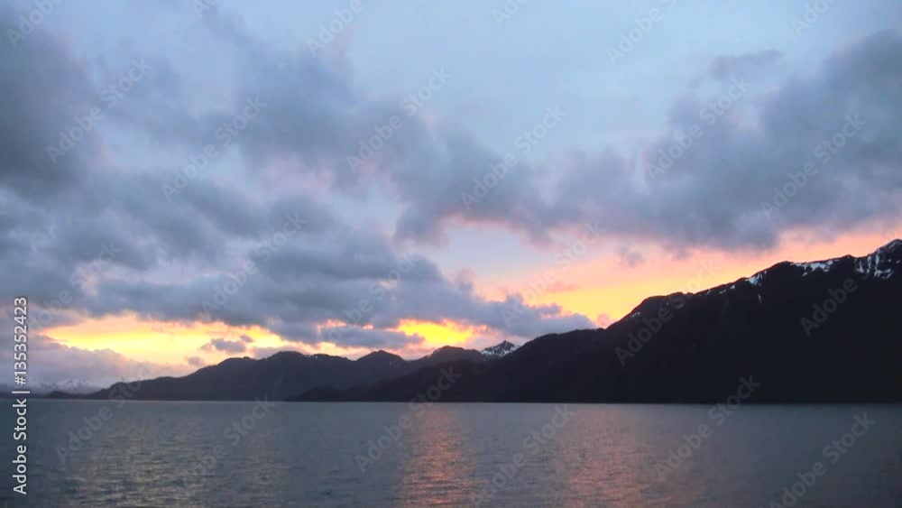 Evening mood above Beagle Channel, Tierra del Fuego, Chile - Antarctica Cruise - Travel Destination Evening mood above Beagle Channel, Tierra del Fuego, Chile - Antarctica Cruise - Travel Destination